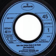 1987 Stephan Remmler 7-45 "Unter einer kleinen Decke in der Nacht (Das Kuschellied)" (DE: Mercury / Phonogram 888 526-7). - Plattenetikette Seite A